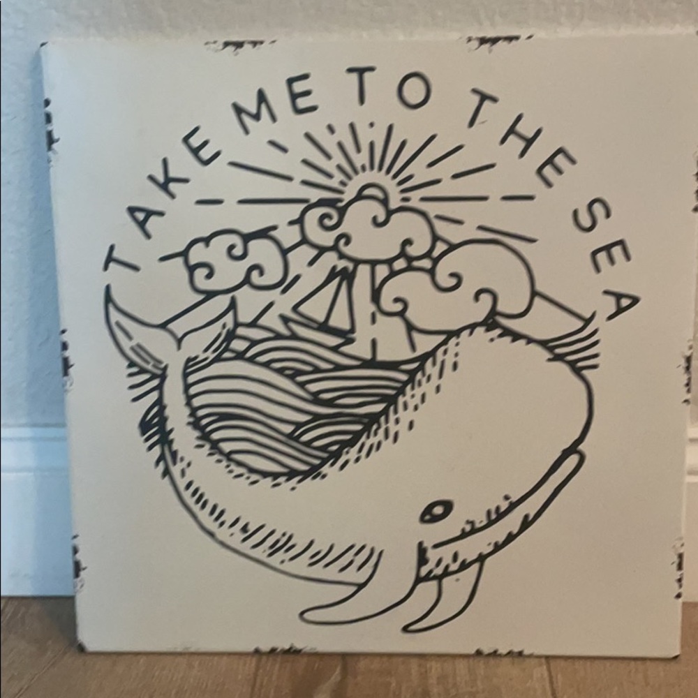 Whale artwork on metal